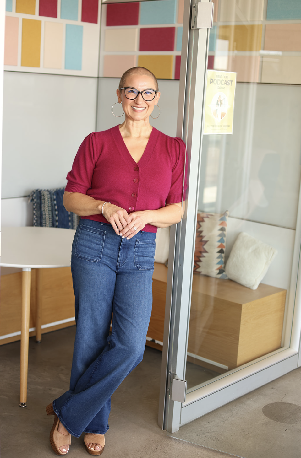Dr. Jill White seated in a purple sweater
